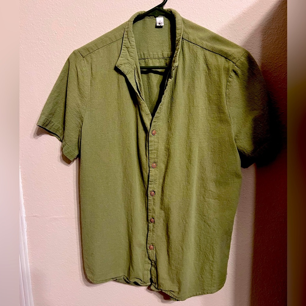 COPY - Olive green button-up shirt.
